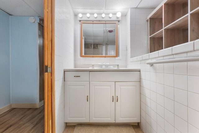 bathroom featuring vanity and wood finished floors