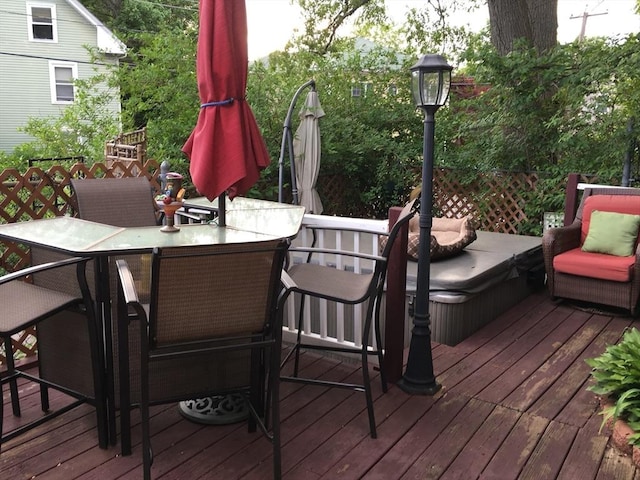 wooden deck with outdoor dining space