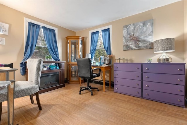 office area with light wood-style floors