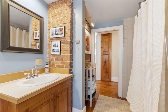 20 Andrew St, Salem, MA 01970 - full bathroom with wood finished floors and vanity