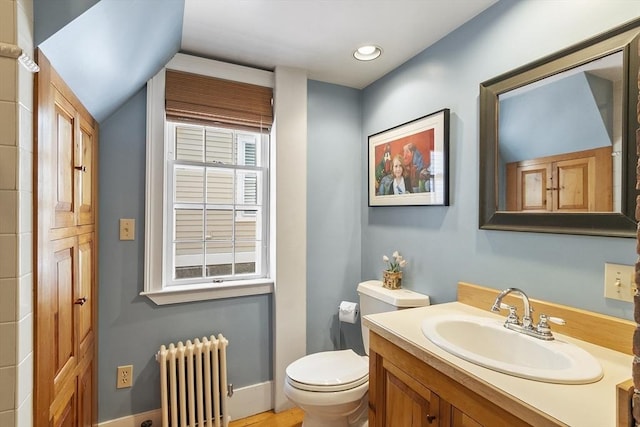 20 Andrew St, Salem, MA 01970 - bathroom featuring toilet, radiator, vanity, and recessed lighting