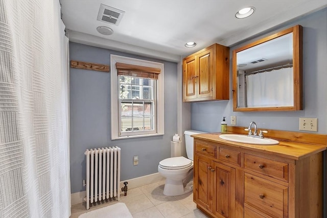 20 Andrew St, Salem, MA 01970 - bathroom featuring toilet, baseboards, radiator heating unit, visible vents, and tile patterned flooring