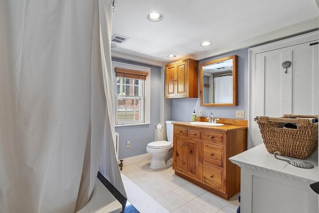 20 Andrew St, Salem, MA 01970 - bathroom featuring toilet, visible vents, recessed lighting, tile patterned flooring, and baseboards