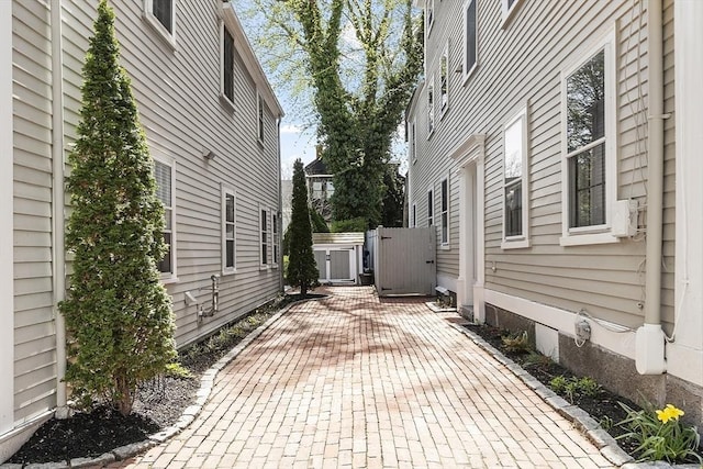 20 Andrew St, Salem, MA 01970 - view of home's exterior with a patio and a gate