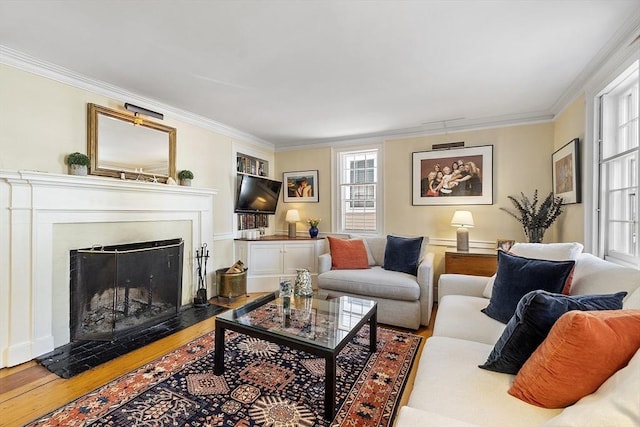20 Andrew St, Salem, MA 01970 - living room featuring ornamental molding, a fireplace with flush hearth, and wood finished floors