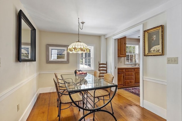 20 Andrew St, Salem, MA 01970 - dining area featuring light wood finished floors and baseboards