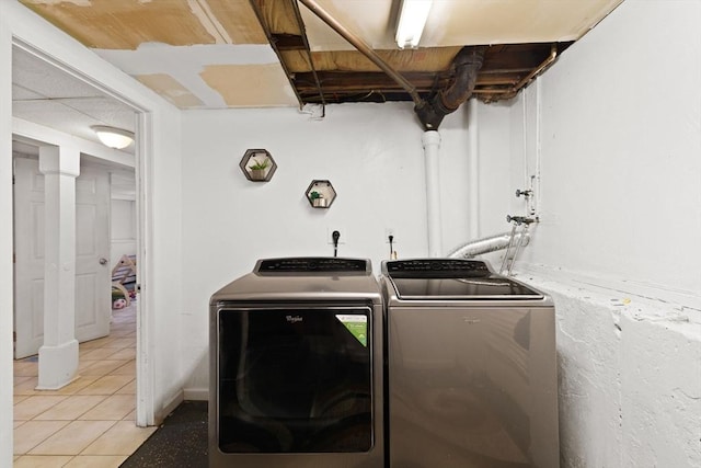 42 Mary Anne Ave, Brockton, MA 02302 - washroom featuring separate washer and dryer and light tile patterned flooring