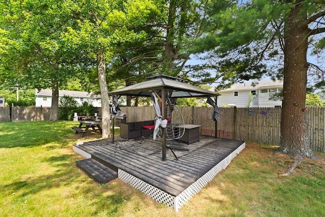 42 Mary Anne Ave, Brockton, MA 02302 - wooden deck with a gazebo, a fenced backyard, and an outdoor hangout area
