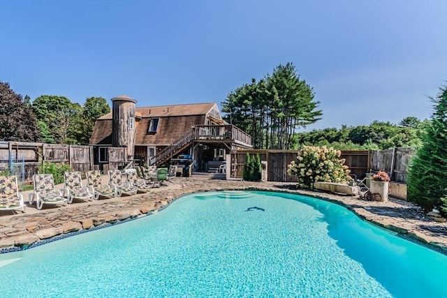 view of pool featuring a deck