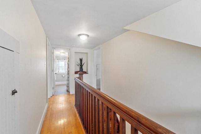 49 Maple St, Oakham, MA 01068 - corridor featuring light wood-style flooring, an upstairs landing, and baseboards