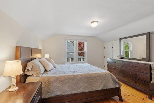 49 Maple St, Oakham, MA 01068 - bedroom with light wood-style flooring and vaulted ceiling