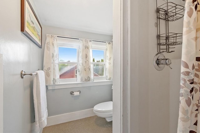 49 Maple St, Oakham, MA 01068 - bathroom with toilet, a shower with shower curtain, and baseboards