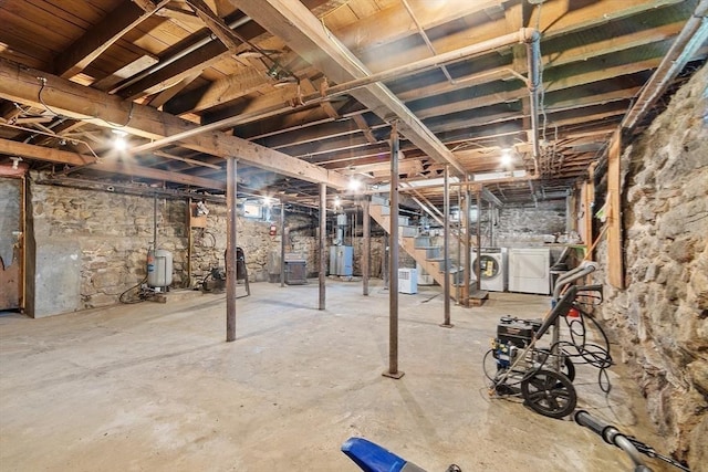 49 Maple St, Oakham, MA 01068 - unfinished below grade area with independent washer and dryer and water heater