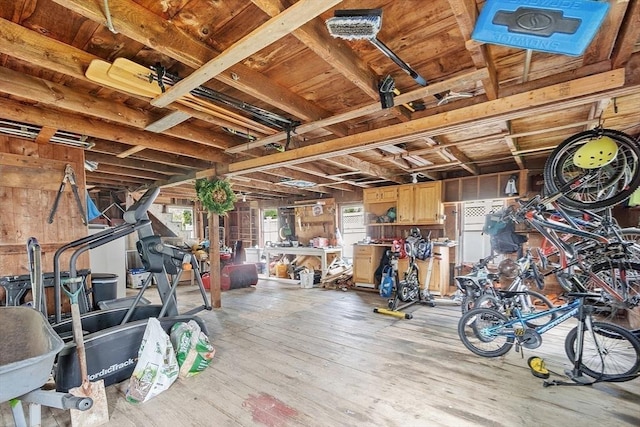 49 Maple St, Oakham, MA 01068 - exercise area featuring light wood-style flooring and a garage