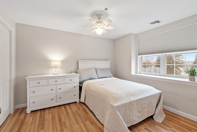 46 Ashford Unit 14, Methuen, MA 01844 - bedroom with light wood-style flooring and a ceiling fan
