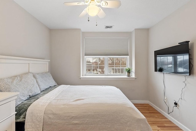 46 Ashford Unit 14, Methuen, MA 01844 - bedroom featuring light wood finished floors and ceiling fan