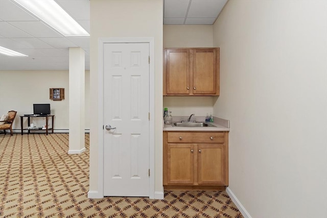 46 Ashford Unit 14, Methuen, MA 01844 - bar area featuring a drop ceiling and a baseboard radiator