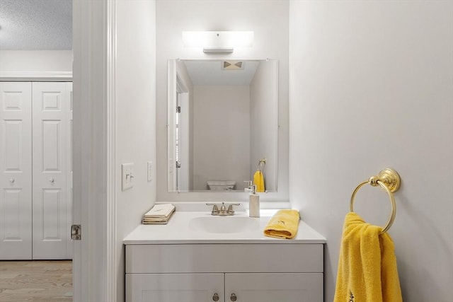 46 Ashford Unit 14, Methuen, MA 01844 - bathroom with vanity and wood finished floors
