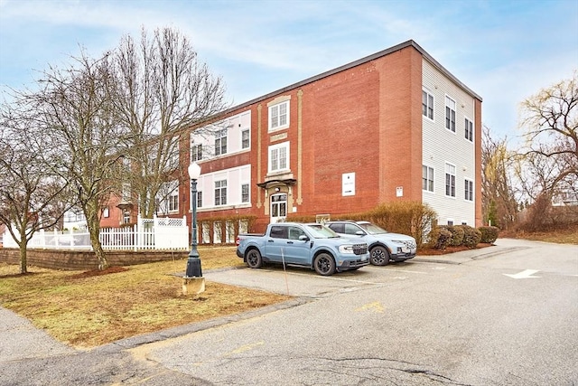 46 Ashford Unit 14, Methuen, MA 01844 - view of property featuring uncovered parking