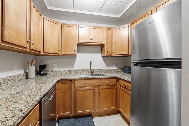 46 Ashford Unit 14, Methuen, MA 01844 - kitchen with stainless steel appliances and light stone counters