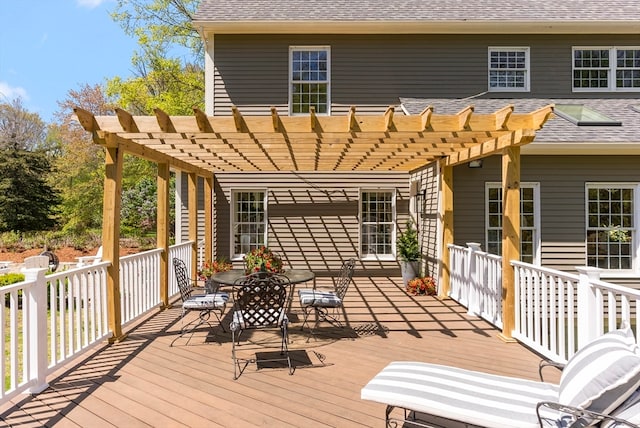 wooden terrace with a pergola