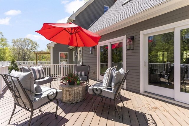 wooden deck with outdoor lounge area