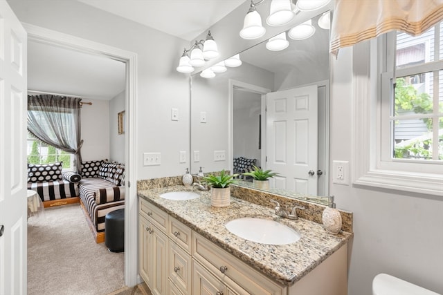 bathroom with a wealth of natural light and vanity