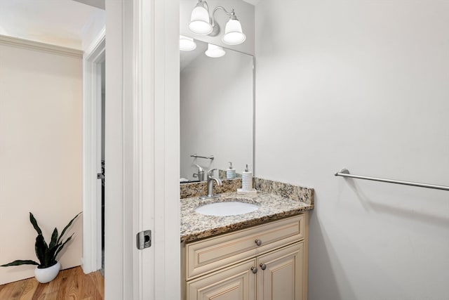 bathroom featuring vanity and hardwood / wood-style flooring