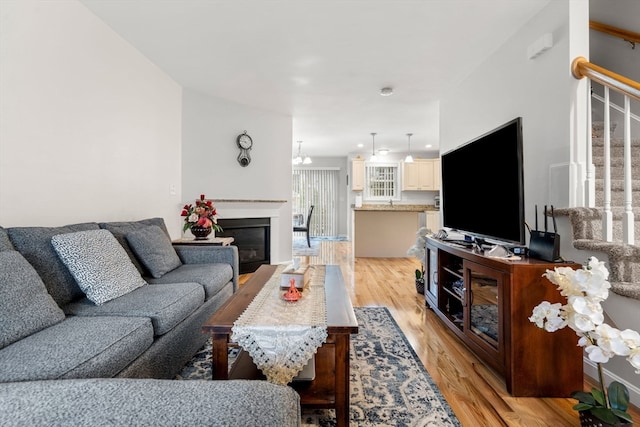 living room with light hardwood / wood-style flooring