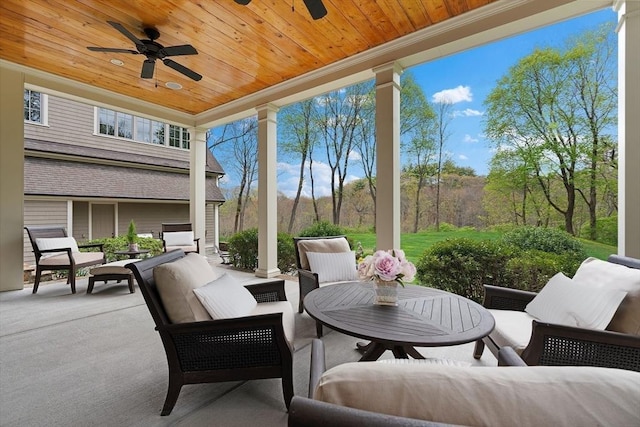 view of patio featuring outdoor lounge area and a ceiling fan