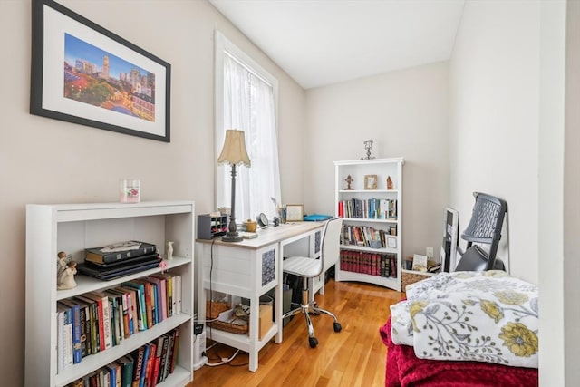 office space with wood finished floors
