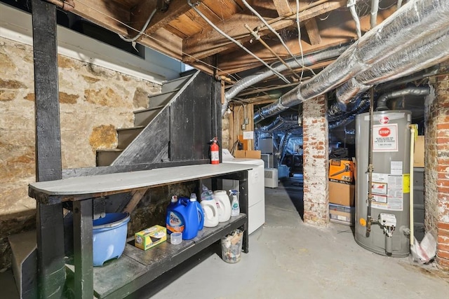 unfinished below grade area with gas water heater