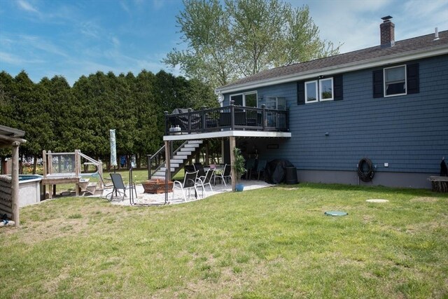 139 Barneyville Rd, Swansea, MA 02777 - back of house featuring an outdoor fire pit, a patio area, a wooden deck, stairway, and a chimney