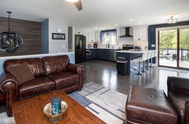 139 Barneyville Rd, Swansea, MA 02777 - living area with dark wood-type flooring, a ceiling fan, and recessed lighting