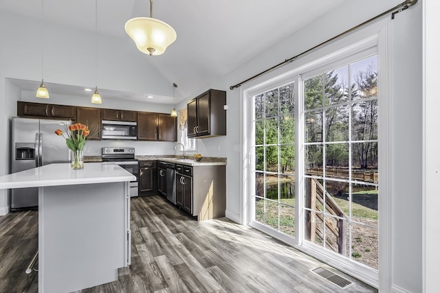 1 Lois Ln, Townsend, MA 01469 - kitchen featuring visible vents, plenty of natural light, a sink, vaulted ceiling, and stainless steel appliances