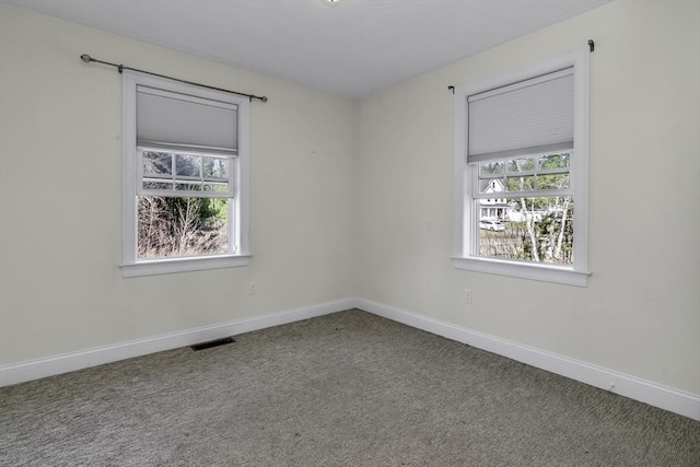 1 Lois Ln, Townsend, MA 01469 - unfurnished room featuring carpet flooring, baseboards, visible vents, and a healthy amount of sunlight