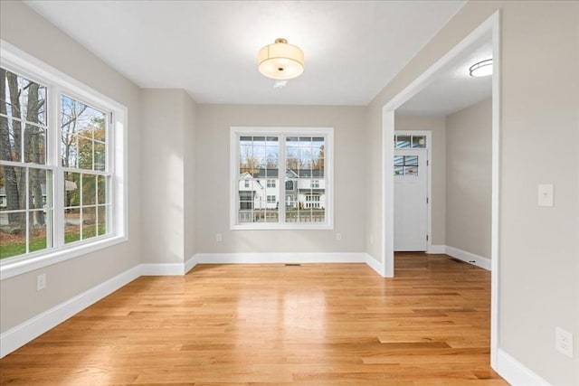 70 Princeton St, Holden, MA 01522 - unfurnished dining area featuring light wood-style flooring and a healthy amount of sunlight