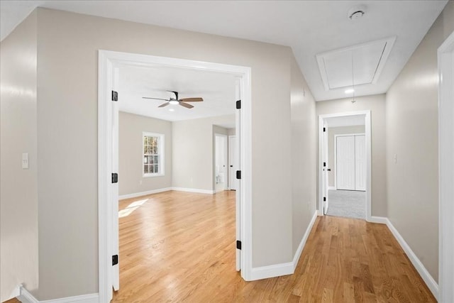 70 Princeton St, Holden, MA 01522 - corridor with light wood finished floors, attic access, and baseboards