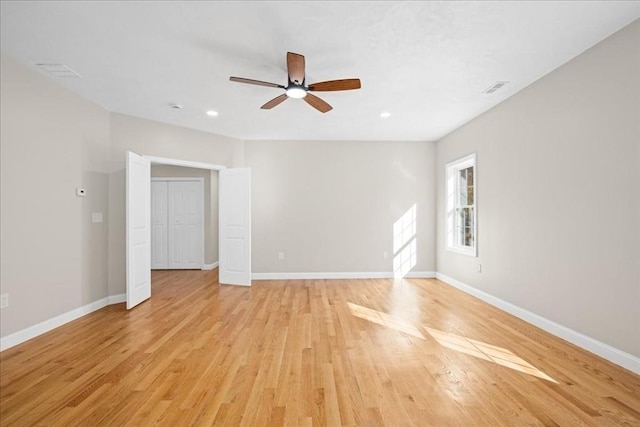 70 Princeton St, Holden, MA 01522 - empty room featuring ceiling fan, baseboards, light wood-type flooring, and visible vents