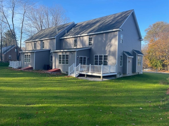 70 Princeton St, Holden, MA 01522 - back of property featuring a deck, a yard, and central AC