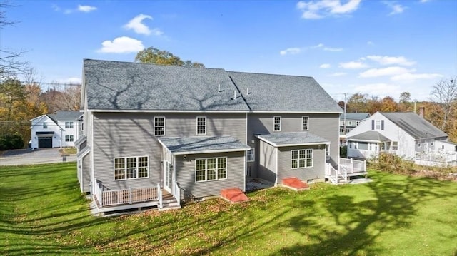 70 Princeton St, Holden, MA 01522 - rear view of property featuring a deck and a lawn