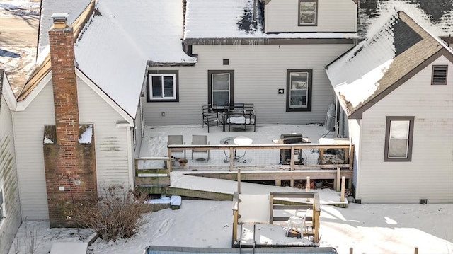 view of snow covered property