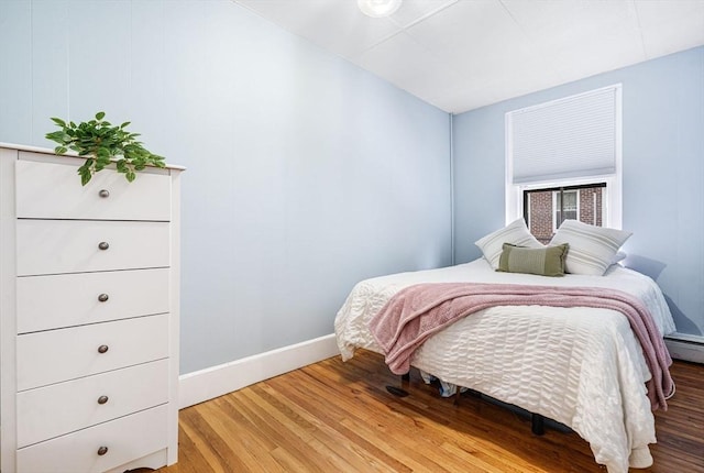 bedroom featuring hardwood / wood-style flooring