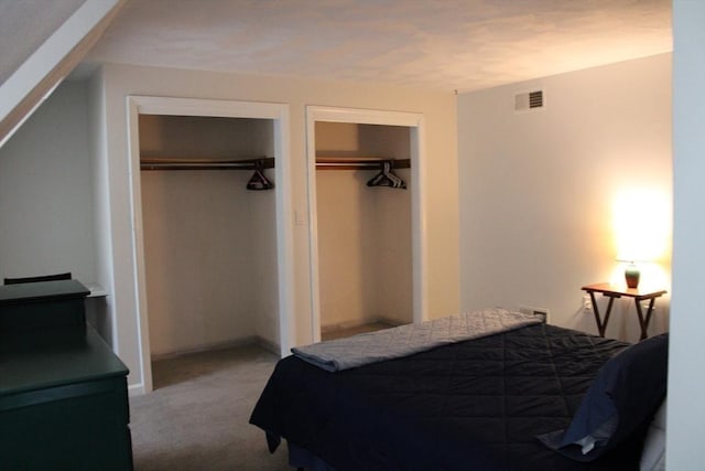 139 Wellman Ave Unit 139, Chelmsford, MA 01863 - bedroom with two closets and light colored carpet