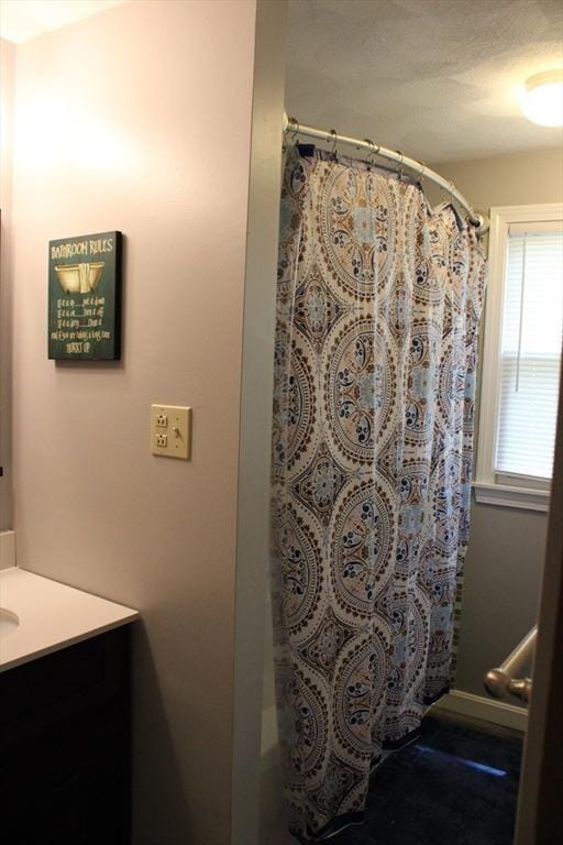 139 Wellman Ave Unit 139, Chelmsford, MA 01863 - bathroom featuring vanity and curtained shower