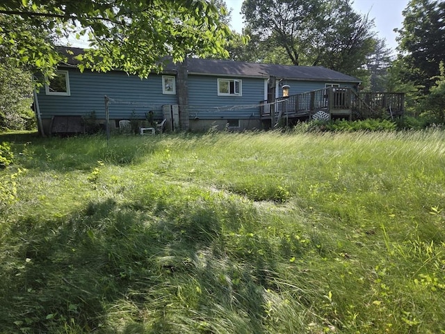 417 Bigelow St, Marlborough, MA 01752 - back of property featuring a wooden deck