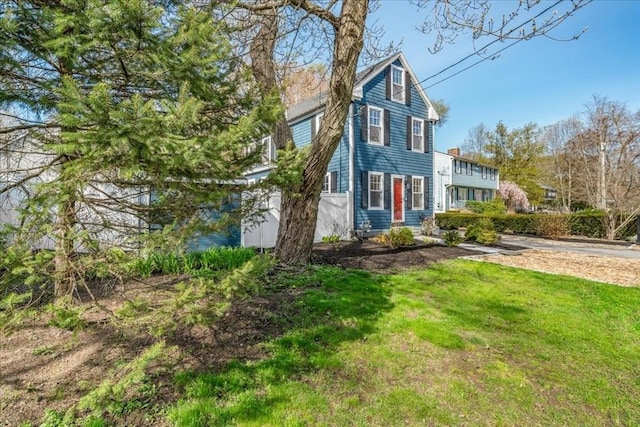 view of front of property with a front yard