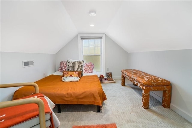 carpeted bedroom featuring baseboards, visible vents, and lofted ceiling