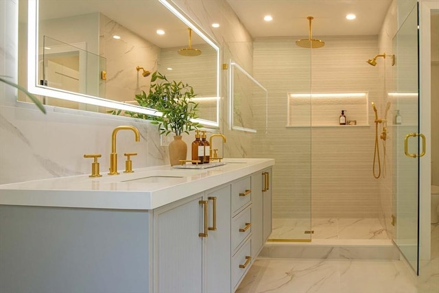 276-278 Nevada Unit 276, Newton, MA 02460 - bathroom featuring marble look tile flooring, a shower stall, double vanity, and recessed lighting