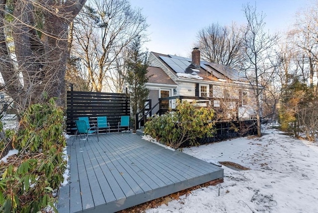 view of snow covered deck